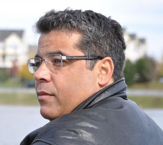 Side photo view of Walt Melo